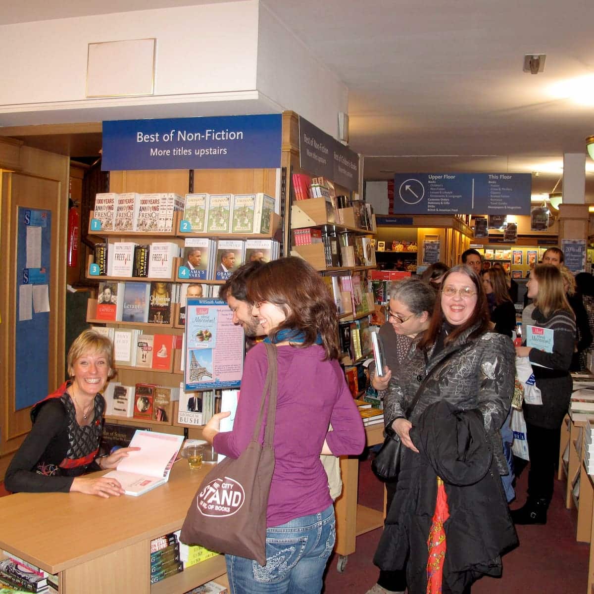 Jill Colonna, author of Mad About Macarons, at a book signing event at WHSmith Paris